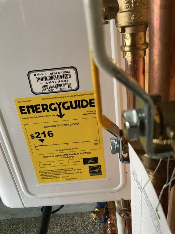 Installed new Navien NPE-240A2 tankless water heater with recirculation system to replace existing conventional water heating unit. Replaced existing expansion tank with new S12 4.5-gallon water heater expansion tank during installation. All copper piping connections, brass fittings, and pressure relief components were properly installed and tested for proper operation.