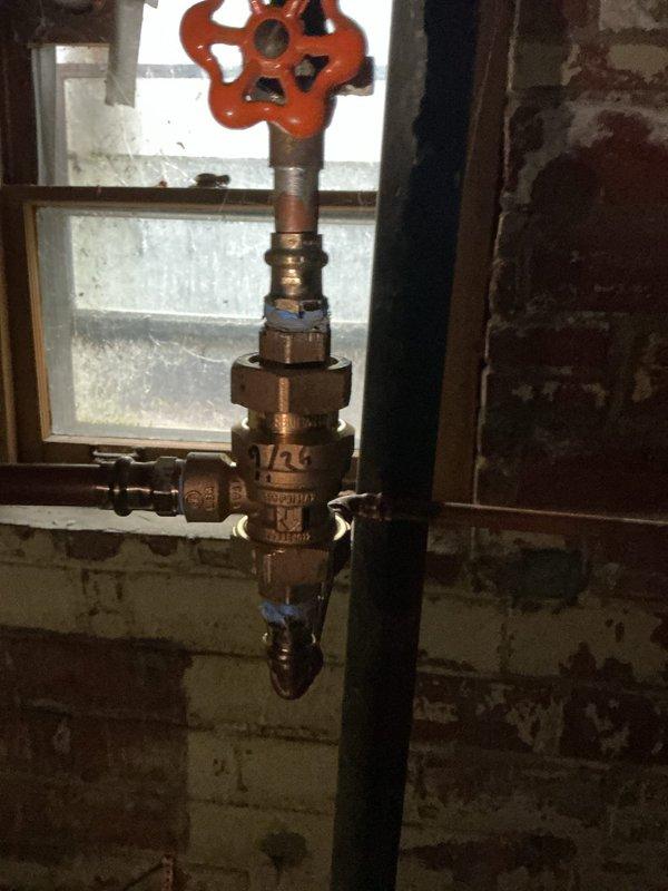 Performed routine annual maintenance on a two-year-old Weil-McLain boiler system located in basement. Inspected circulator pump assembly, verified proper operation of motor and control box with indicator lights functioning correctly. Examined all piping connections, isolation valves, and unions for signs of leaks or deterioration. Checked sight glass for proper water level and clarity. Verified gate valve operation and inspected all brass fittings and connections throughout the heating loop. System operating within normal parameters with no issues identified or repairs required.
