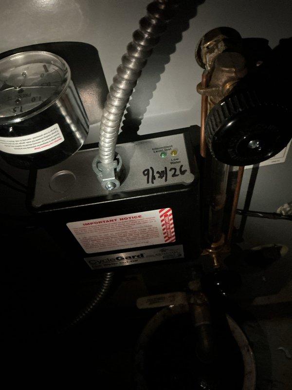 Performed routine annual maintenance on a two-year-old Weil-McLain boiler system located in basement. Inspected circulator pump assembly, verified proper operation of motor and control box with indicator lights functioning correctly. Examined all piping connections, isolation valves, and unions for signs of leaks or deterioration. Checked sight glass for proper water level and clarity. Verified gate valve operation and inspected all brass fittings and connections throughout the heating loop. System operating within normal parameters with no issues identified or repairs required.