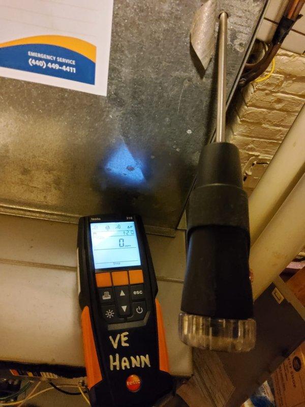 Performed comprehensive tune-up on 20-year-old Carrier furnace operating without reported issues. Conducted combustion analysis using Testo 310 analyzer, recording CO levels at 23 ppm and temperature differential of 9.5°F, confirming safe and efficient operation. Completed full system inspection including heat exchanger examination, burner assembly cleaning, blower motor lubrication, air filter replacement, and thermostat calibration to ensure optimal performance and safety for the heating season.