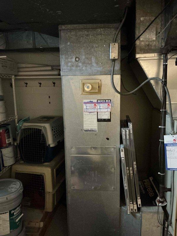 # HVAC Estimate - Replacement Completed

Conducted comprehensive assessment of existing furnace system and associated HVAC components in basement utility area for replacement estimate. Documented current equipment configuration including furnace unit, ductwork layout, humidifier system, electrical connections, and air handling components to provide accurate replacement recommendations and specifications.