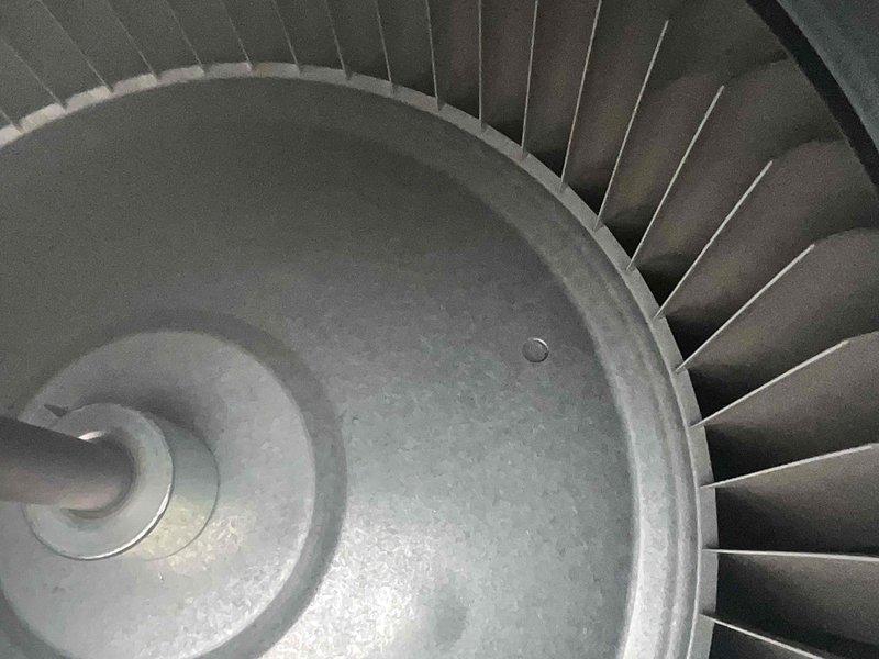 Completed comprehensive maintenance service on a 15-year-old gas heating system. Performed combustion analysis using diagnostic equipment to verify proper CO and CO2 levels, with temperature readings indicating normal operating parameters at 90.9°F. Inspected blower wheel assembly, confirming fan blades and motor hub are in serviceable condition with normal wear patterns for equipment age. All system components tested and operating within manufacturer specifications.