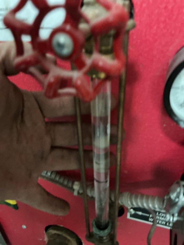 Responded to no-heat call for boiler not lighting. Upon inspection, found ignition system failure preventing burner from firing. Cleaned flame sensor, inspected gas valve assembly and sight glass, verified proper gas flow, and tested ignition sequence. System restored to normal operation with burner lighting properly and heating cycle functioning as designed.