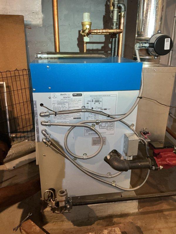 Completed annual maintenance tune-up on a 5-year-old residential hot water boiler system. Performed comprehensive system inspection, tested operational controls and safety devices, verified proper combustion and venting, checked circulator pump function, inspected all piping connections for leaks, and confirmed temperature and pressure readings were within manufacturer specifications using calibrated diagnostic equipment.