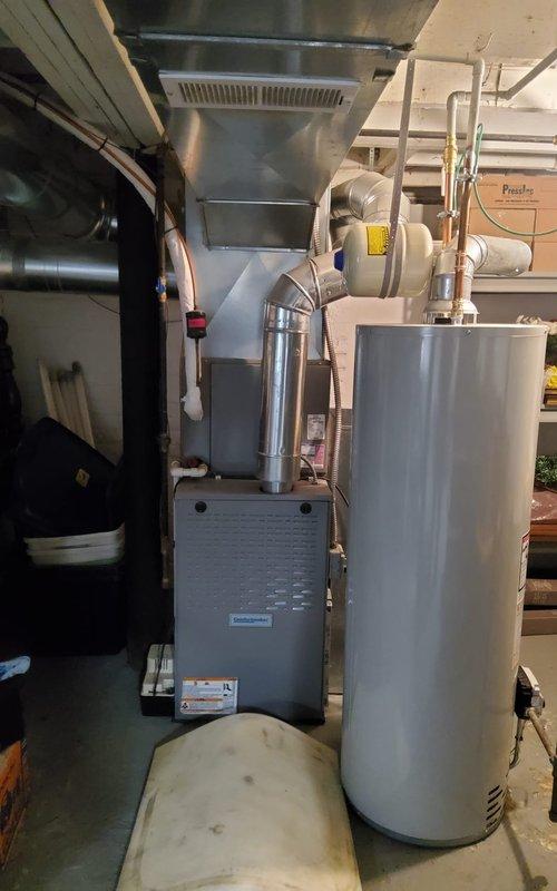 Removed blower motor and wheel assembly from furnace and performed thorough cleaning of all components to restore proper airflow throughout the system. Service completed to improve overall HVAC performance and air circulation efficiency.
