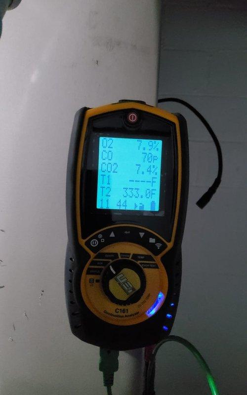 Completed comprehensive heating tune-up on 3-year-old furnace system per home plan maintenance schedule. Performed combustion analysis using digital analyzer, confirming proper CO and CO2 levels with temperature readings within manufacturer specifications at 78°F and optimal combustion efficiency. Inspected gas burner assembly during operation, verified proper ignition sequence with characteristic blue flame pattern across all burner ports, checked gas manifold pressure regulation, and confirmed all electrical connections and safety controls functioning correctly.