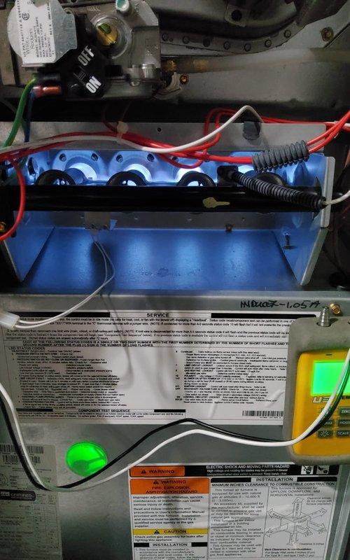 Completed comprehensive heating tune-up on 3-year-old furnace system per home plan maintenance schedule. Performed combustion analysis using digital analyzer, confirming proper CO and CO2 levels with temperature readings within manufacturer specifications at 78°F and optimal combustion efficiency. Inspected gas burner assembly during operation, verified proper ignition sequence with characteristic blue flame pattern across all burner ports, checked gas manifold pressure regulation, and confirmed all electrical connections and safety controls functioning correctly.