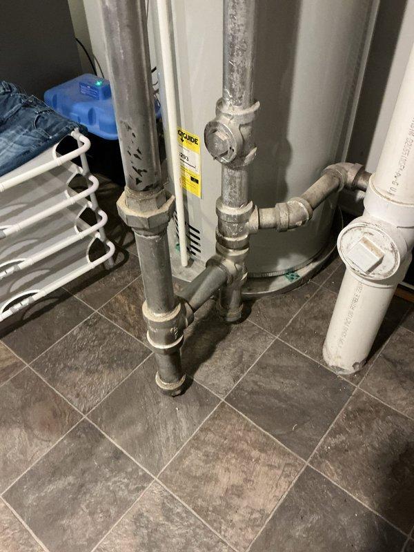 Completed comprehensive tune-up on 20-year-old boiler system located in basement. Performed standard maintenance procedures including inspection of burner assembly, heat exchanger, piping connections, and electrical components. System found operating within normal parameters with no deficiencies noted; all components properly secured and functioning as designed.