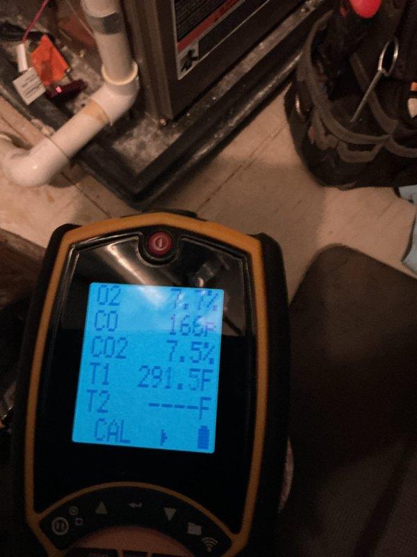 Performed comprehensive heating system tune-up on Carrier furnace located in basement. Conducted thorough inspection of furnace cabinet, heat exchanger, and burner assembly. Verified proper operation of integrated Carrier humidifier system with visual inspection of water supply lines and shut-off valves. Tested combustion efficiency using digital analyzer, recording oxygen levels at 16.5%, carbon monoxide readings, carbon dioxide levels, and temperature differentials with supply air at 281°F and return air at 75°F. All combustion parameters within manufacturer specifications. Inspected ductwork connections and metallic flex conduit for secure fastening and proper sealing. Verified electrical connections and wiring integrity throughout system. Examined PVC drainage lines and confirmed proper valve operation. Provided guidance on ecobee thermostat system operation and programming as requested. System operating efficiently with no deficiencies noted. All safety controls functioning proper