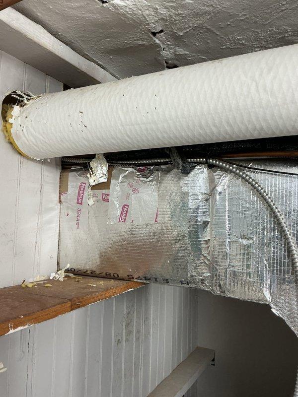 # HVAC Maintenance - Heating System Service

Completed comprehensive preventive maintenance on a 15-year-old boiler heating system. Performed full system inspection including visual assessment of ductwork, insulation integrity, and mechanical components in the attic/utility space. Documented existing wear on flexible ductwork showing outer jacket degradation and minor fraying with exposed insulation material, as well as accumulation of dust and debris on system components. Verified proper operation of heating equipment and electrical connections. System operational upon completion of maintenance protocol.