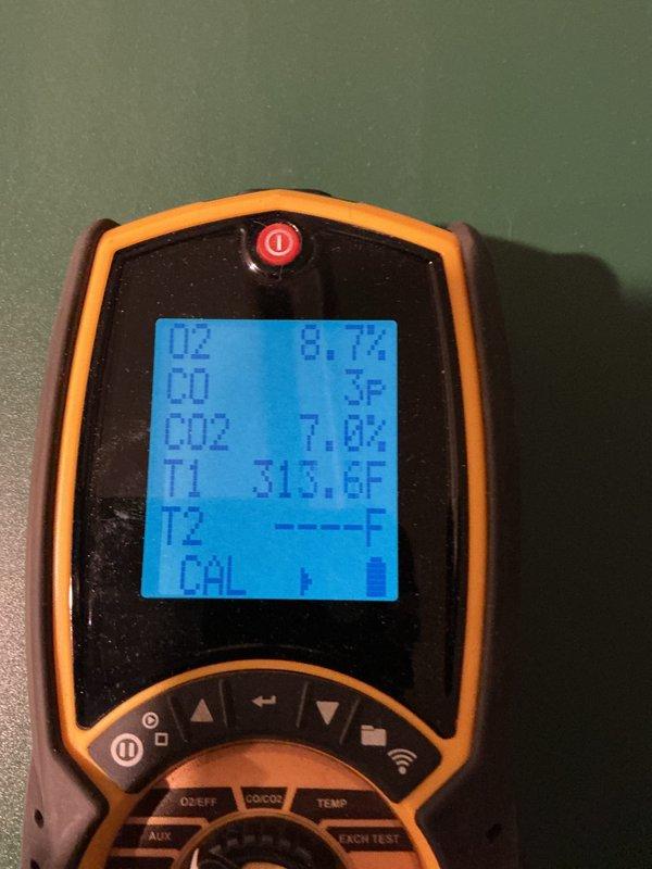 # HVAC Maintenance - Steam Boiler

Performed routine maintenance on residential boiler system located in basement mechanical room. Conducted comprehensive combustion analysis using calibrated digital analyzer to assess system performance and efficiency. Measured flue gas composition with readings showing oxygen level at 8.7%, carbon dioxide at 7.0%, carbon monoxide at 3 ppm, and stack temperature at 313.6°F. All combustion values fell within acceptable parameters, indicating proper burner operation and fuel-to-air ratio.

Visually inspected boiler unit, associated piping systems, and connected components including water heater and expansion tank. Examined copper piping for signs of corrosion, leaks, or deterioration. Verified proper installation and mounting of all system components on platform base. Checked pressure relief valve, gauges, and control panel for proper operation. Inspected ductwork connections and ventilation pathways to ensure safe exhaust of combustion gases.

System o