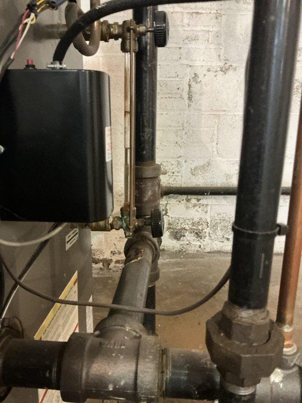Completed preventative maintenance on 20-year-old boiler system, including inspection of gas valve assembly, pressure relief valve mechanisms, piping connections, and expansion tank. Air handler maintenance was deferred due to ambient temperature conditions preventing proper AC system evaluation. Customer expressed interest in smart thermostat upgrade for future consideration.