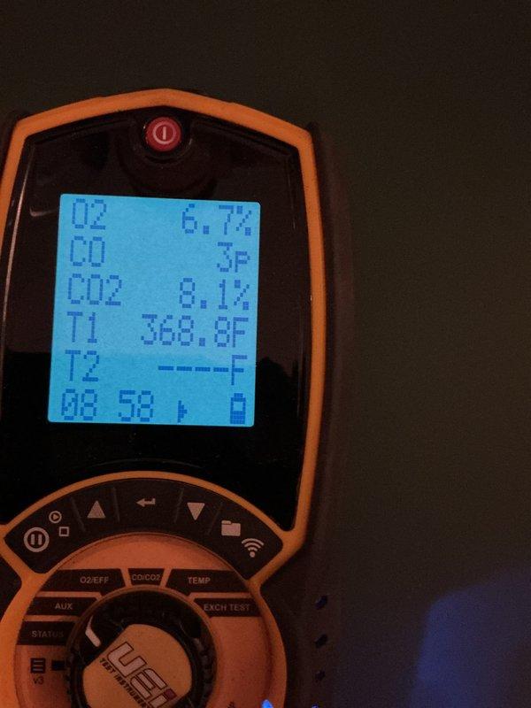 Performed annual maintenance on a 2-year-old residential boiler system. Conducted combustion analysis using digital analyzer, recording oxygen levels at 6.7%, CO at 3 ppm, CO2 at 8.1%, and stack temperature at 368.8°F, all within acceptable parameters. Inspected all mechanical components, copper piping connections, brass valves, and control systems in basement mechanical room. Customer inquired about system flushing service; advised that additional evaluation and separate quote would be required for that procedure.