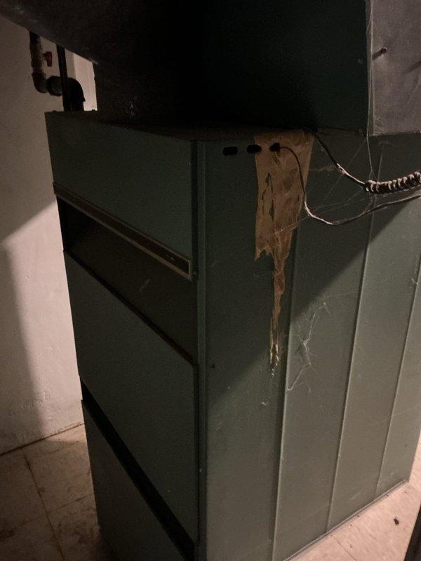 Conducted comprehensive assessment of 31-year-old furnace system showing significant deterioration and visible staining indicative of long-term operational stress. Documented existing equipment condition, noting rust discoloration and age-related wear on cabinet surfaces. Provided detailed replacement estimate for complete furnace system upgrade to modern, energy-efficient unit meeting current safety and performance standards.