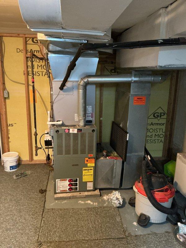 Responded to no heat call for 22-year-old furnace system. Conducted comprehensive assessment of existing HVAC equipment in basement mechanical room, documented current installation including furnace unit, ductwork configuration, and surrounding utility components. Provided detailed replacement estimate for new heating system to restore comfort and reliability.