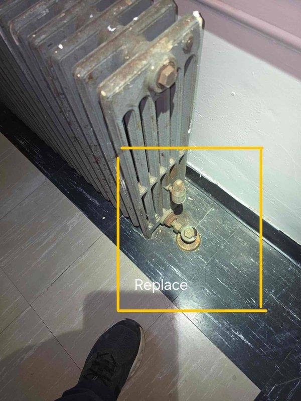 Performed inspection of boiler heating system with newer boiler unit connected to older distribution system. Identified multiple cast iron radiators throughout property exhibiting leaks at control valves and excessive operational noise. Documented deteriorated radiator conditions showing significant corrosion, rust accumulation on surfaces and fins, and failing valve connections with visible moisture damage. Recommended replacement of aging radiators and associated valve assemblies to eliminate leaks and restore quiet system operation.