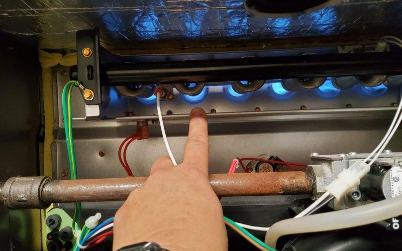 Performed routine maintenance and tune-up on an eight-year-old furnace located in utility closet with no reported issues. Conducted comprehensive system diagnostics using combustion analyzer, measuring oxygen levels at 9.3%, carbon dioxide at 6.2%, and temperature readings at 94.8°F to verify proper combustion efficiency. Inspected burner assembly during operation, confirming clean blue flame pattern across all burner ports and proper ignition sequence, while examining gas supply lines and copper piping for integrity and signs of corrosion or wear.