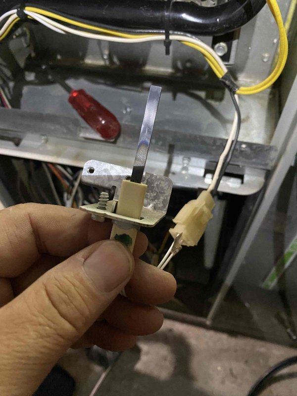Performed comprehensive tune-up on 23-year-old furnace with no reported issues. Conducted temperature diagnostics using digital multimeter, recording heat exchanger temperature of 357.5°F. Removed, inspected, and cleaned flame sensor rod to ensure proper ignition and flame detection capability for reliable system operation.