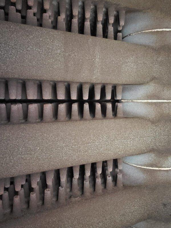 Performed maintenance on 24-year-old steam boiler system. Addressed stuck valve issue and inspected heat exchanger components, which showed significant frost and ice accumulation on evaporator coils indicating potential airflow restriction or refrigerant issues. Examined burner tubes and piping, noting corrosion and rust on lower pipe sections requiring monitoring for future service needs.