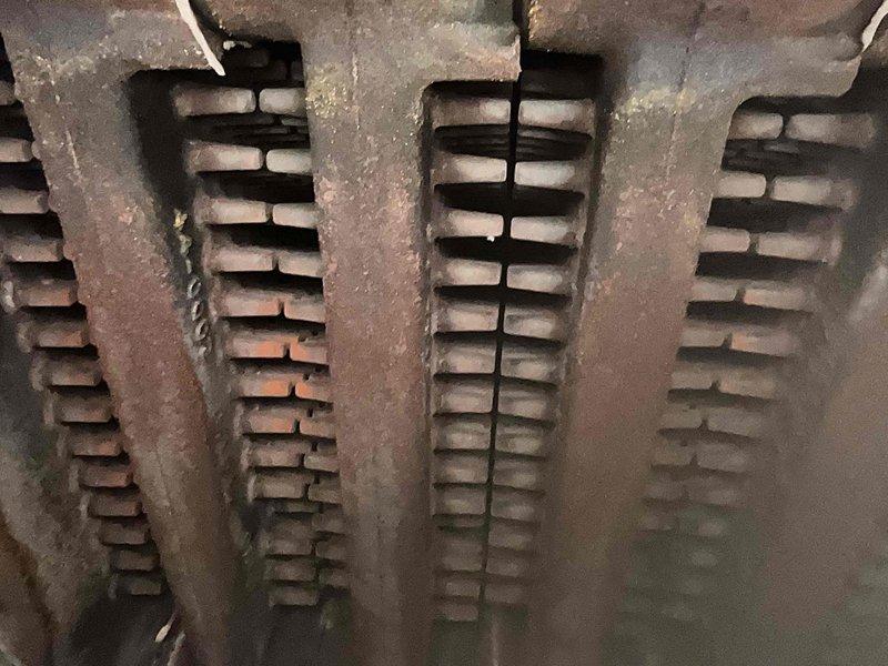 Performed fall tune-up on 6-8 year old Slant/Fin boiler system located in basement. Conducted comprehensive inspection of heat exchanger sections, which showed normal age-related dust accumulation and minor surface oxidation but remained structurally sound with no signs of cracking or failure. Completed combustion analysis using digital analyzer, recording oxygen levels at 19.8%, carbon monoxide at 4.3 ppm, carbon dioxide at 1.1%, and stack temperature at 153.1°F, all within acceptable operating parameters. Verified proper operation of all system controls, pressure gauges, and safety devices. Inspected burner assembly and confirmed clean combustion with no evidence of sooting or incomplete burning. Checked all piping connections, valves, and flexible conduit for secure fittings and proper installation. System currently in off-season mode with no operational issues detected; unit is ready for heating season activation.