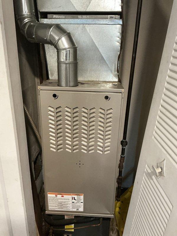 Responded to no heat call on 20+ year old gas furnace that would not turn on. Upon inspection, diagnosed failed hot surface ignitor preventing furnace from initiating heating cycle. Replaced ignitor, tested all safety controls including flame sensor and limit switches, verified proper gas valve operation and flame characteristics. System restored to full operation with normal heating functionality confirmed.