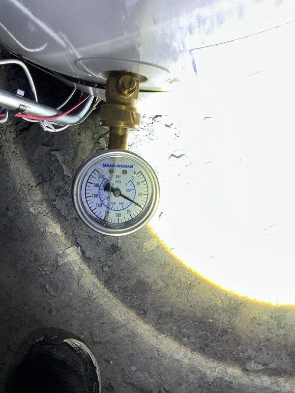 Responded to service call for newly installed tanked water heater producing hissing sound that required emergency shutdown by fire department. Upon arrival, inspected unit and plumbing connections, verified pressure gauge readings, and assessed gas line and shutoff valve integrity to identify source of abnormal noise and ensure safe operation of the system.