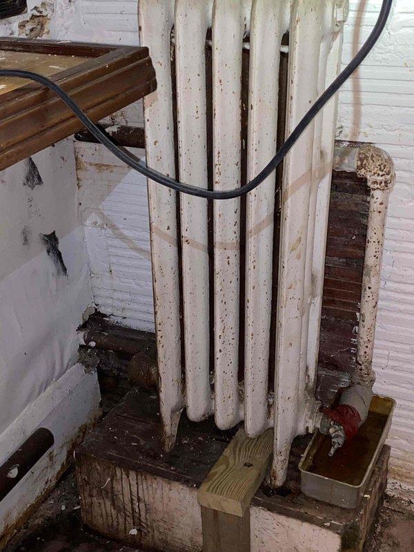 Responded to service call for 20-year-old natural gas steam boiler with active leaking from return piping. Upon inspection, found significant corrosion and deterioration on copper return lines and connections, with visible rust, oxidation, and moisture damage throughout the piping system. Documented extensive wear on steam distribution piping, radiator connections, and associated components showing age-related degradation. Photographed leak source areas and overall system condition for customer records and repair recommendations.