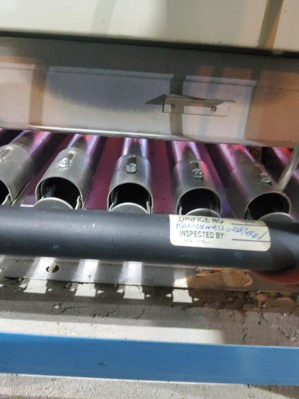 Performed annual maintenance tune-up on a six-year-old steam boiler system. Conducted comprehensive inspection of burner assembly, heat exchanger, and all operational components. System found to be functioning properly with no immediate repairs required. Documented equipment condition through photographic records showing burner operation and heat exchanger status. All safety checks completed and system returned to normal operation.