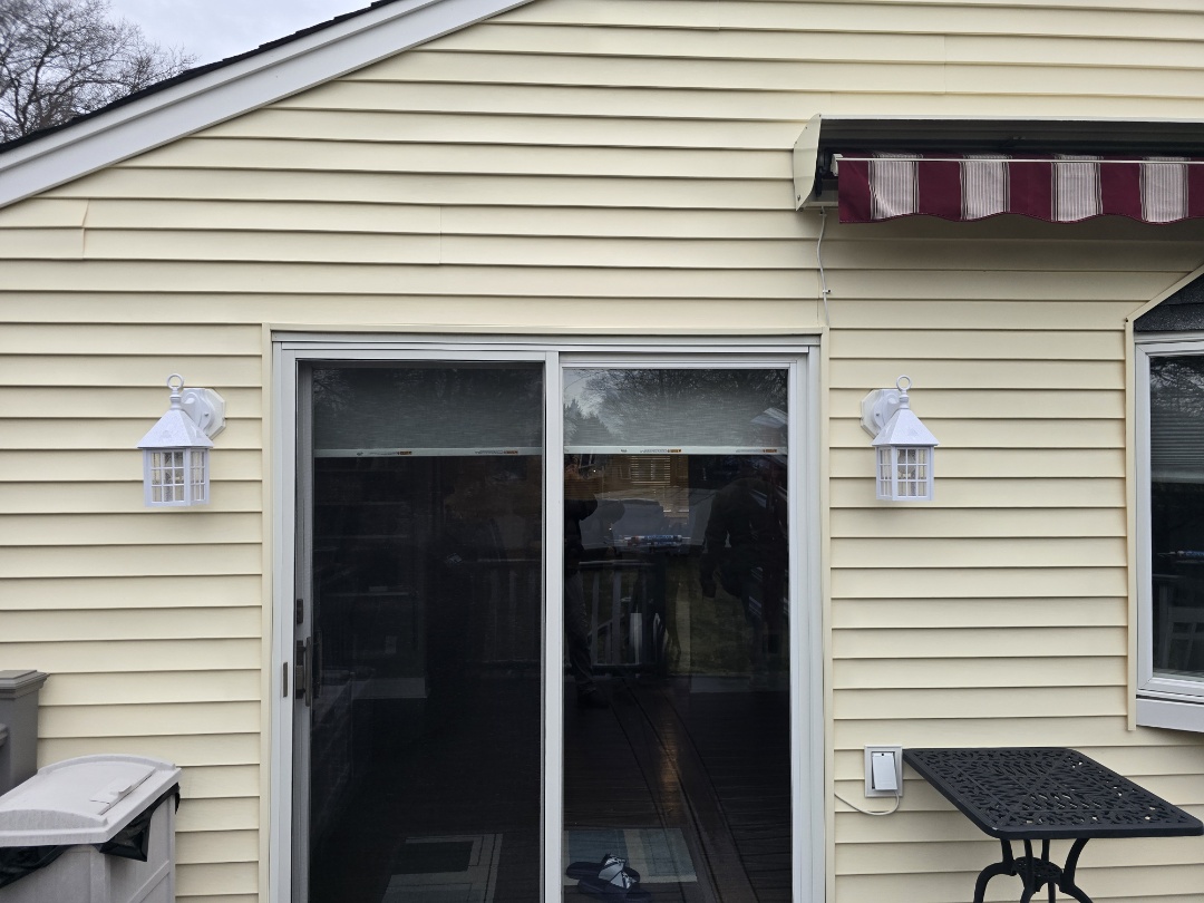 swapped out old outdoor fixtures with customer supplied fixtures. 
