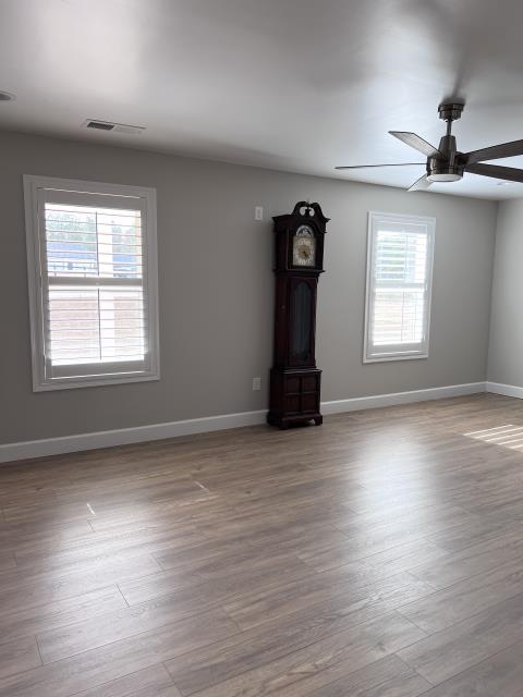 Custom Plantation Shutters w/ Divider and Tilt Rod in Roanoke, Alabama.