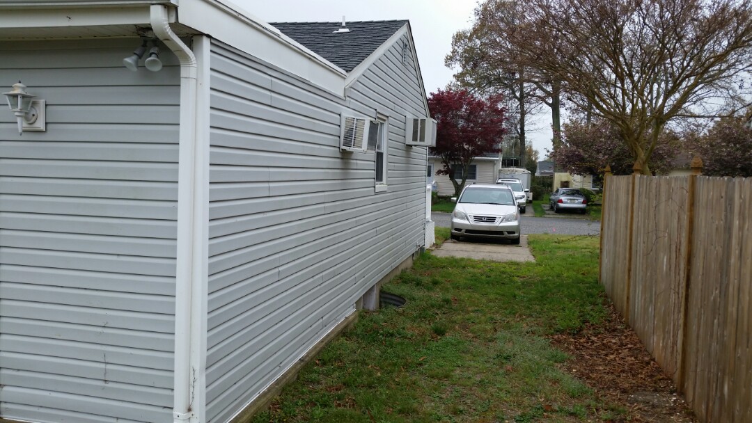 Installing a Mitsubishi ductless cooling and heating system to replace two old window ac units. 