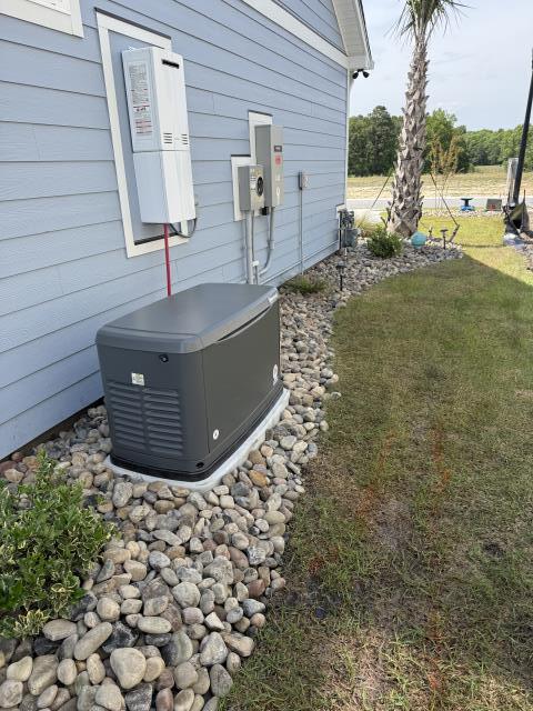 Another successful day with a 22KW Honeywell Generac Generator installation, including a 200 amp automatic transfer switch, ensuring reliable power backup. As You can see another Happy Homeowner that has Powered Up Their Peace Of Mind in North Myrtle Beach, SC 29582