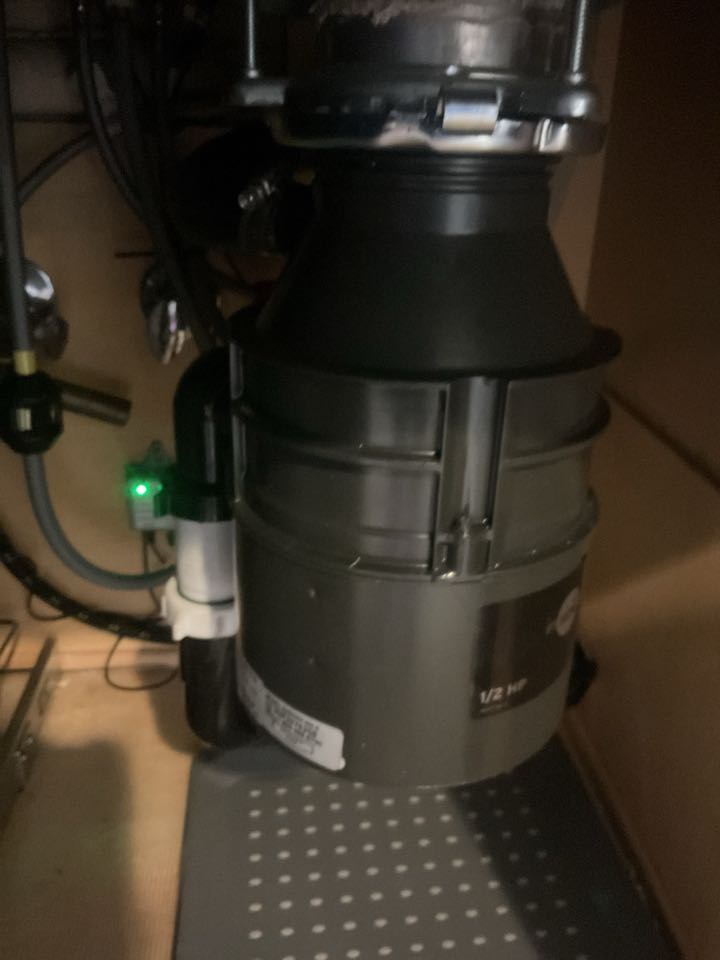 Garage disposal plug removal 