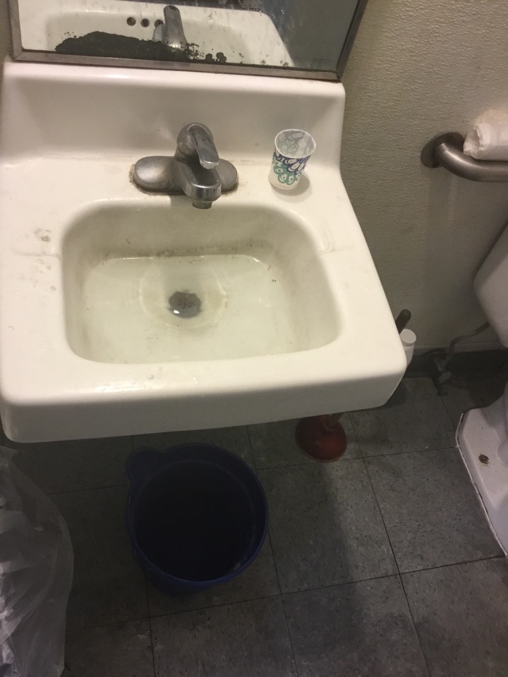 Clear lavatory drain stoppage 