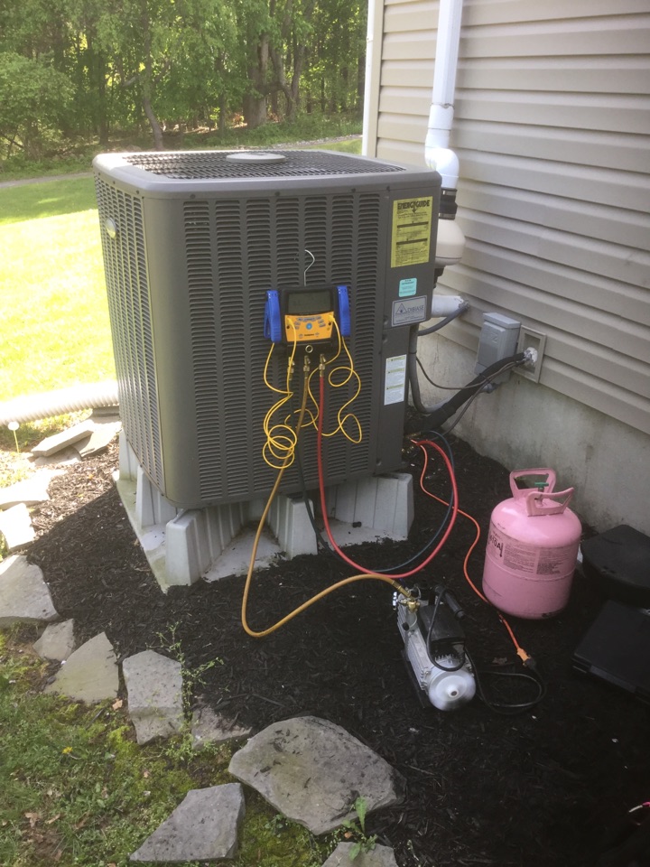 Exton, PA - While doing an AC Tune Up on a Whirlpool Heat Pump System in Exton found a leak on the Indoor Coil. Returned to repair the leak. After brazing the leak, pressure tested the system to ensure it was sealed. Vacuuming the system down before we refill it with refrigerant. Exton, PA - While doing an AC Tune Up on a Whirlpool Heat Pump System in Exton found a leak on the Indoor Coil. Returned to repair the leak. After brazing the leak, pressure tested the system to ensure it was sealed. Vacuuming the system down before we refill it with refrigerant.