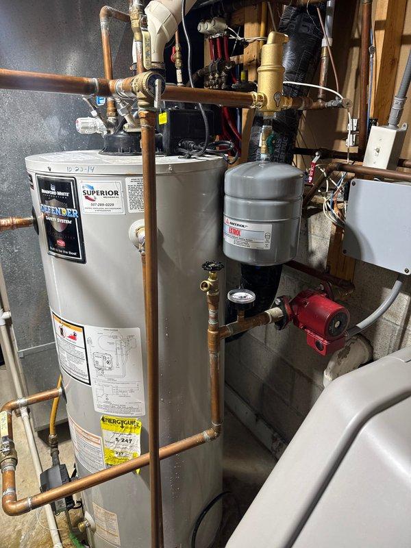 Arrived on-site with technicians Rusty and Tod to install an air scoop and pressure gauge on the residential hydronic heating system. Successfully completed installation of air scoop to improve system efficiency and added pressure gauge for proper system monitoring, enhancing the overall functionality of the customer's heating equipment.