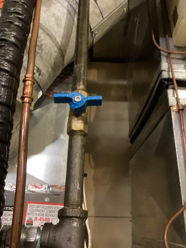 Responded to no heat call where furnace fan was running but producing no heat. Found gas supply shut off at ball valve. Restored gas supply by opening the valve, verified proper system operation with heat production resumed.