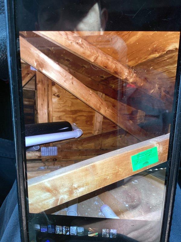 Responded to service call for exhaust pipe freezing issue. Identified condensate from furnace exhaust freezing on home exterior due to vent termination positioned too close to siding. Unable to relocate vent due to structural framing constraints; will require follow-up from Todd to address the situation properly.