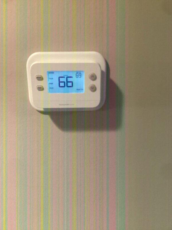 Responded to call regarding no heat on upper level despite functioning heat in basement. Diagnosed issue with main level thermostat not sending signal to boiler system. Replaced faulty thermostat, restoring proper communication and heat distribution throughout the home.