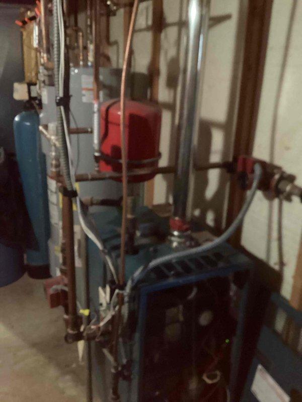 Responded to call regarding no heat on upper level despite functioning heat in basement. Diagnosed issue with main level thermostat not sending signal to boiler system. Replaced faulty thermostat, restoring proper communication and heat distribution throughout the home.