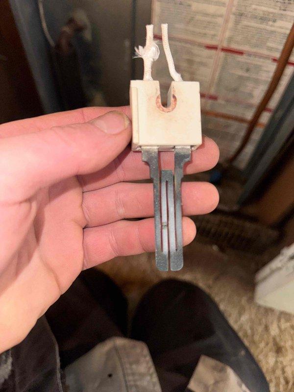 Responded to no heat call for older mobile home furnace displaying single flash code. Diagnosed failed hot surface igniter (HSI) as shown by visual inspection. Replaced defective HSI component, performed leak check, and verified proper system operation before completing service.