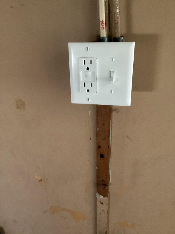 Conducted electrical service inspection per customer request. Accessed property via lock box to address correction items from previous estimate. Inspected GFCI outlet installation and associated wiring, verifying proper function of ground fault protection. Documentation completed with supporting photos of utility connections and electrical installations.