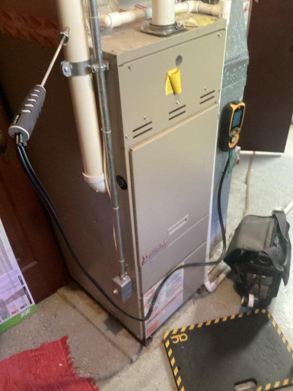 Performed scheduled maintenance agreement tune-up on residential gas furnace. Conducted combustion analysis showing CO at 17 PPM, CO2 at 5.3%, with 12.1% heat loss. System inspection confirmed unit is operating within normal parameters with no issues requiring correction.