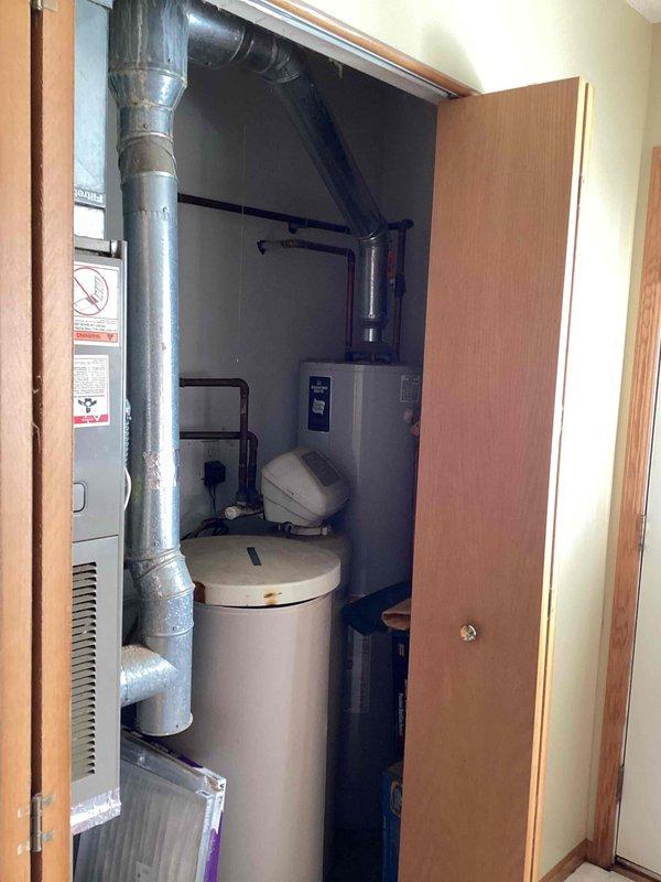 Responded to no heat call for a furnace with combustion issues. Diagnosed dirty flame sensor causing system failure. Performed cleaning of flame sensor to restore proper ignition. Conducted safety checks including temperature rise and carbon monoxide measurements to verify proper system operation. Unit is now functioning correctly with safe combustion parameters.