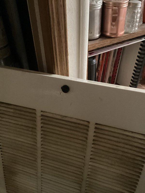 Responded to service call regarding broken furnace door clip. Inspected unit and confirmed clip that secures access panel was broken. Due to replacement part cost considerations, implemented alternative repair solution by securing the furnace door with screws to ensure proper and safe operation.
