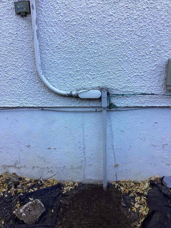 Completed underground electrical trenching work for service restoration. Installed new exterior electrical conduit system connecting junction box to weatherproof outlet box, with appropriate weatherproofing for stucco wall mounting. Successfully restored power after completing all necessary connections and securing interior wiring.