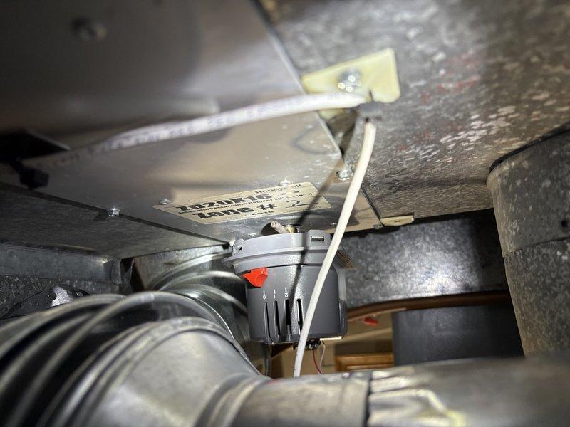 Responded to customer complaint regarding Honeywell ZD20X16 automatic damper malfunction in Zone #2. Upon inspection, determined set screw was rubbing against ductwork, causing improper operation. Successfully adjusted damper motor to restore proper functionality of the zoned heating system.