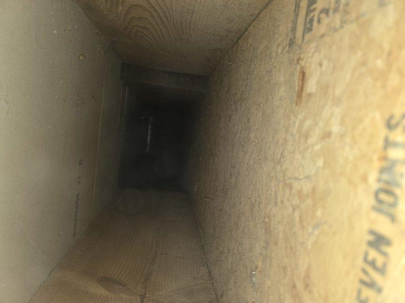 Performed comprehensive duct cleaning service on residential HVAC system, removing accumulated dust and debris from rectangular wooden ductwork and circular flexible ducts. Successfully cleaned all vents and access points, improving system efficiency and air quality prior to client's move-out date.