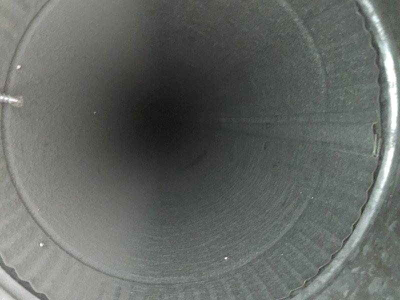 Performed comprehensive duct cleaning service on residential HVAC system, removing accumulated dust and debris from rectangular wooden ductwork and circular flexible ducts. Successfully cleaned all vents and access points, improving system efficiency and air quality prior to client's move-out date.