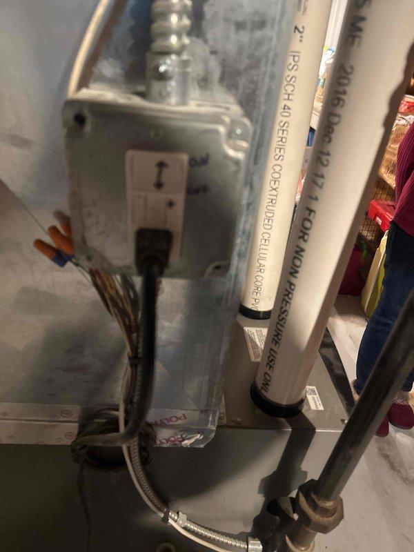 Responded to customer-reported humidifier leak affecting basement floor. Upon inspection, determined GFCI protecting condensate pump had tripped, causing water to overflow. Reset GFCI breaker, monitored system operation and verified proper drainage resumed with no further leakage issues.